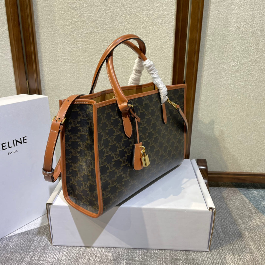 CELINE 25S HORIZONTAL CABAS 34MM IN BLACK TRIOMPHE CANVAS AND BROWN CALFSKIN