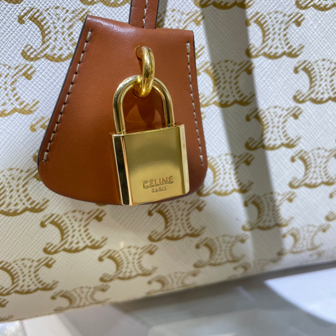 CELINE 25S HORIZONTAL CABAS 34MM IN WHITE TRIOMPHE CANVAS AND BROWN CALFSKIN
