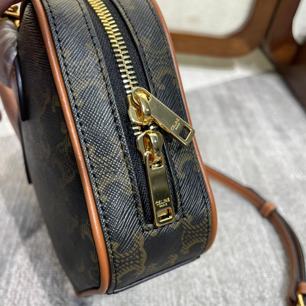 CELINE TOP HANDLE BAG 20 IN BLACK TRIOMPHE CANVAS AND BROWN CALFSKIN