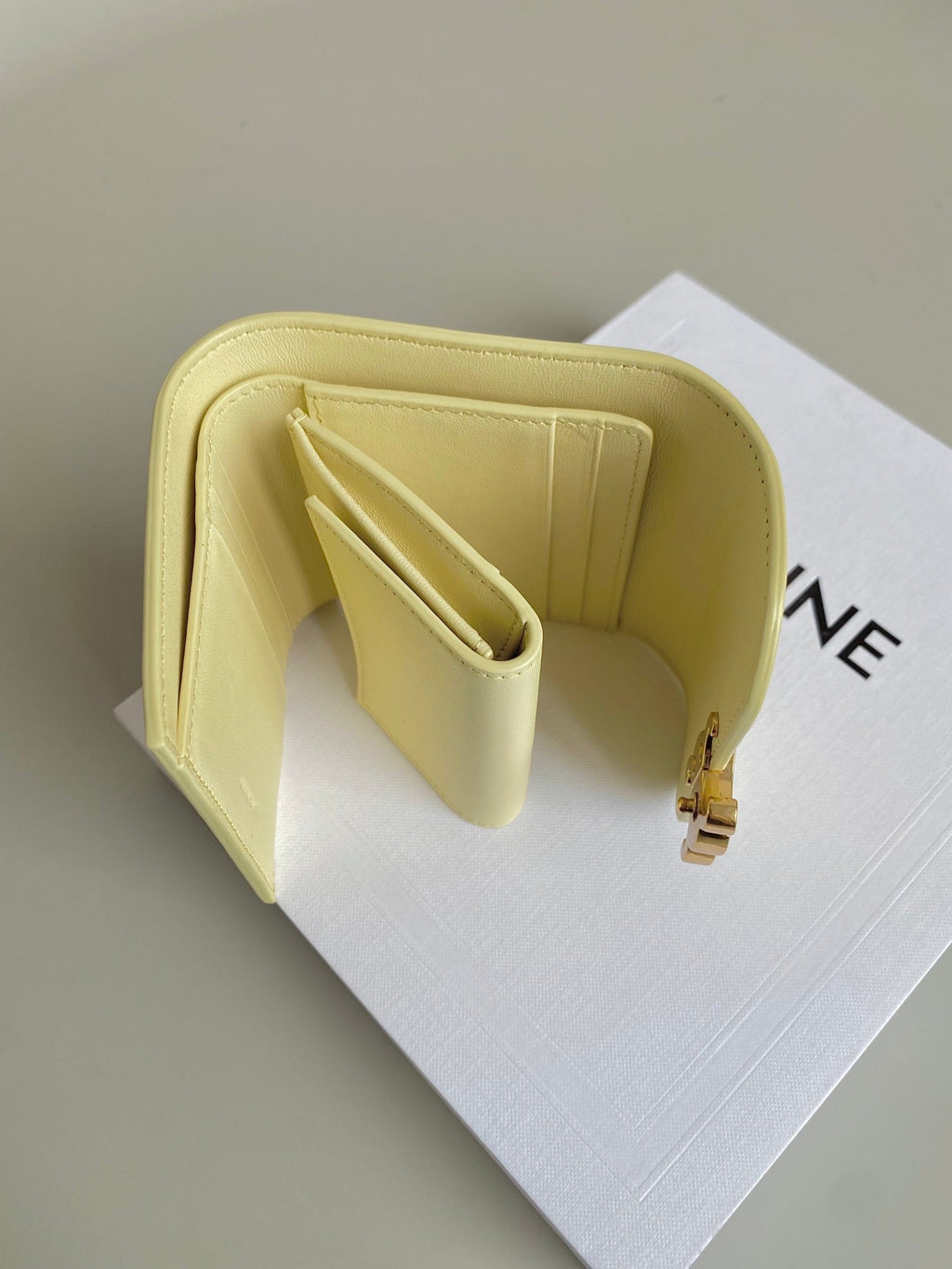 CELINE TRIPHOME 10 TRIFOLD WALLET CALFSKIN YELLOW PASTEL