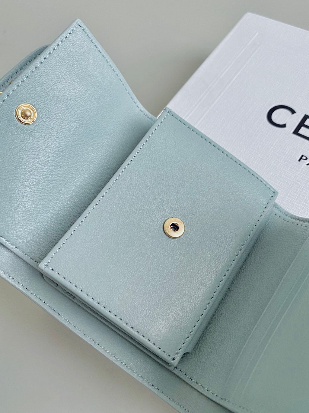 CELINE TRIPHOME 10 TRIFOLD WALLET CALFSKIN BLUE PASTEL