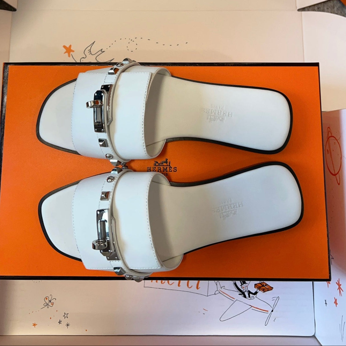 HERMES GIULIA FLAT SANDAL IN WHITE CALFSKIN