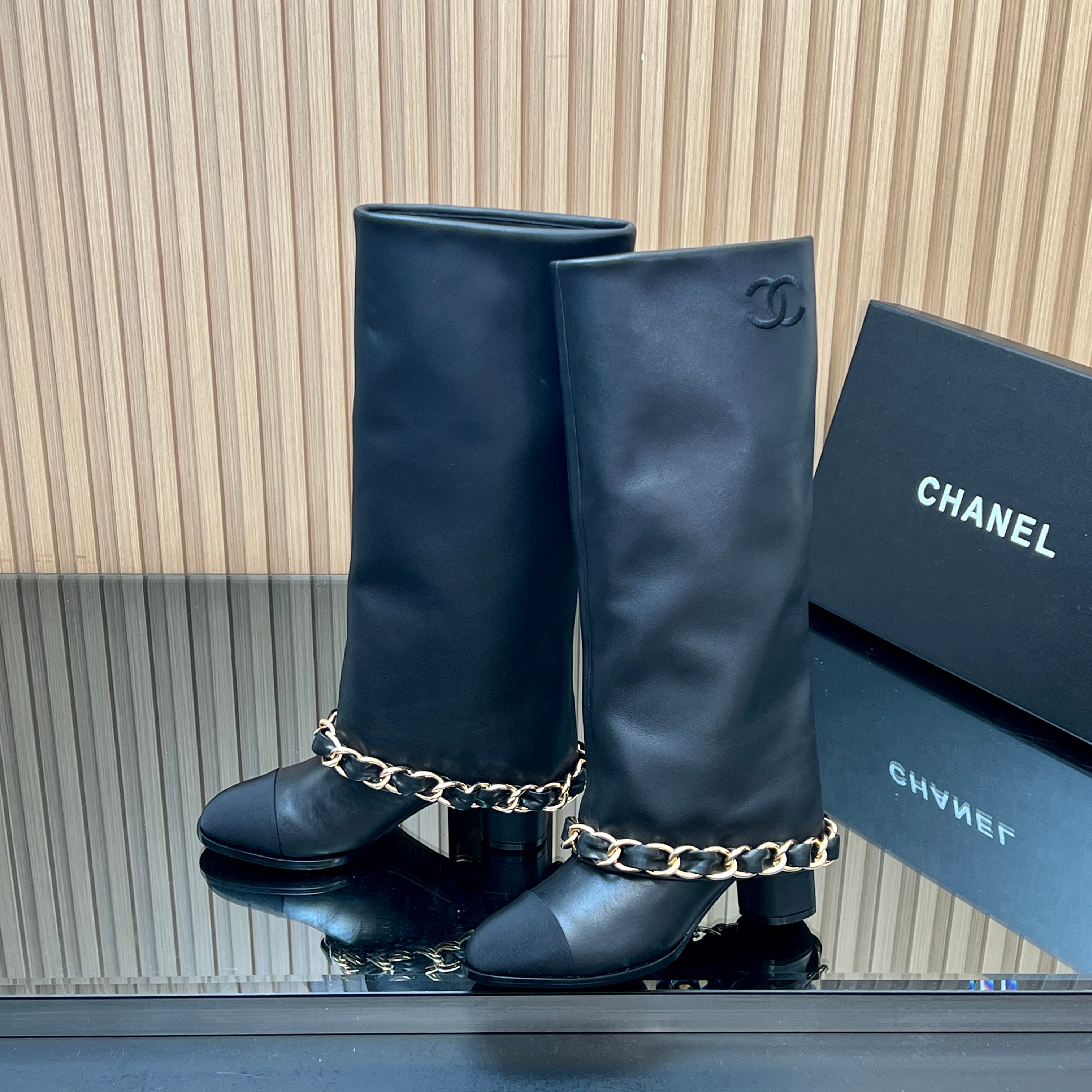 CHANEL 25S KNEE-HIGH HEELED BOOTS 65MM IN BLACK CALFSKIN GOLD HARDWARE