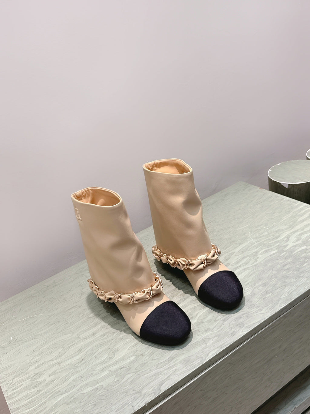 CHANEL 25S CALF-LENGTH BOOTS 45MM IN BEIGE AND BLACK CALFSKIN GOLD HARDWARE