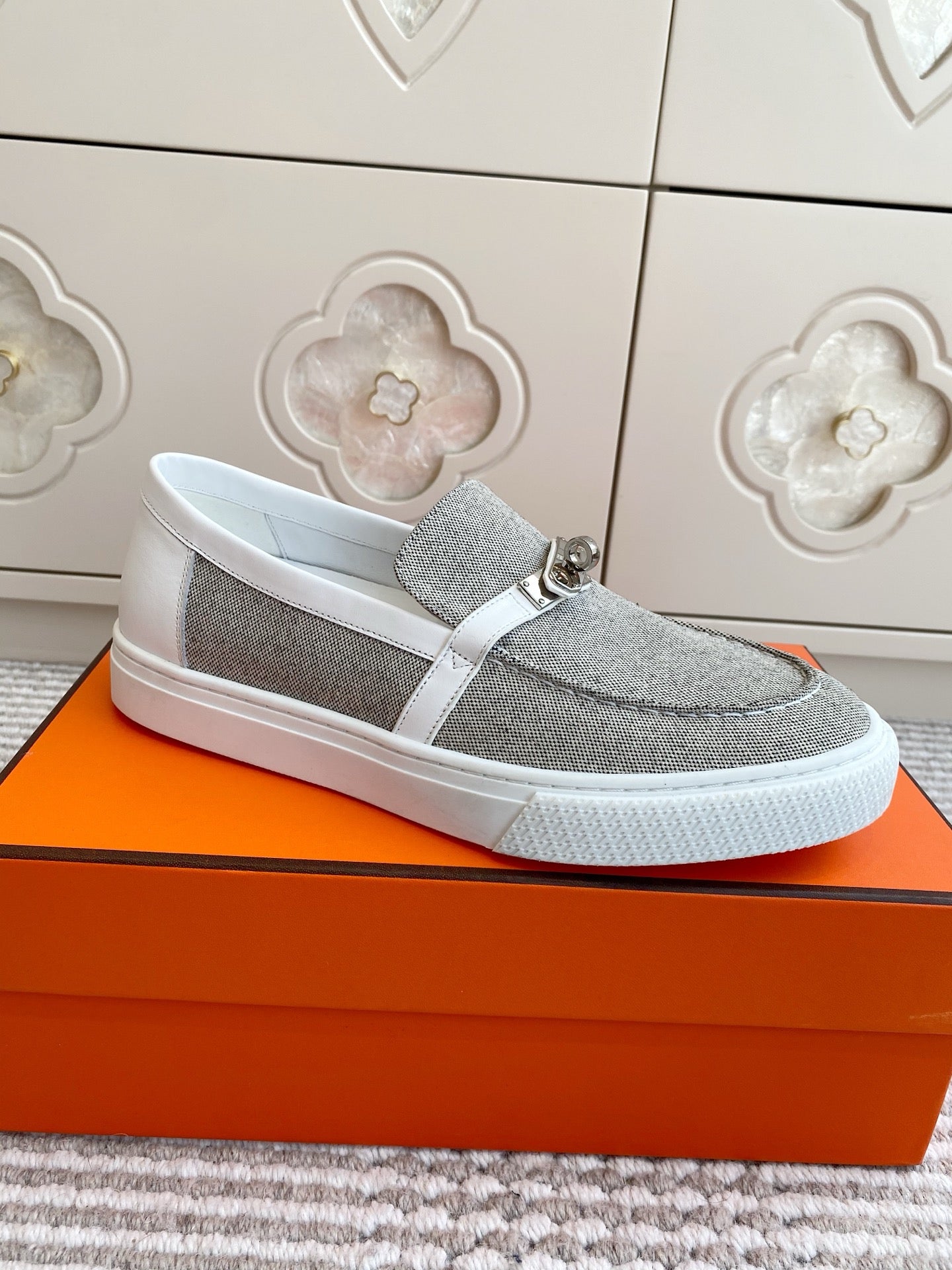 HERMES 25S SLIP-ON IN LIGHT GREY CANVAS WITH SILVER HARDWARE