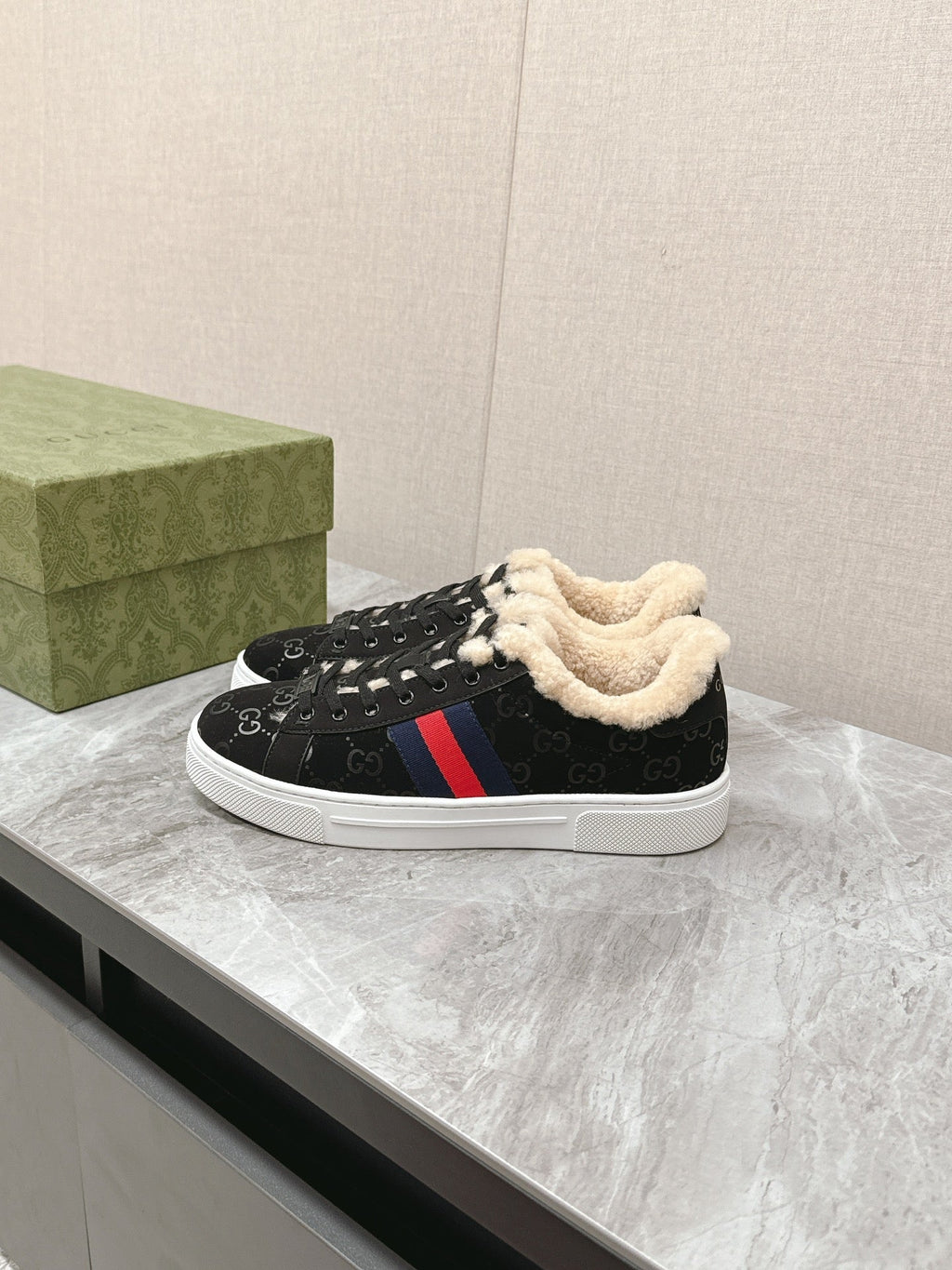 GUCCI ACE SNEAKER WITH WEB IN BLACK EMBOSSED SUEDE AND WOOL LINING