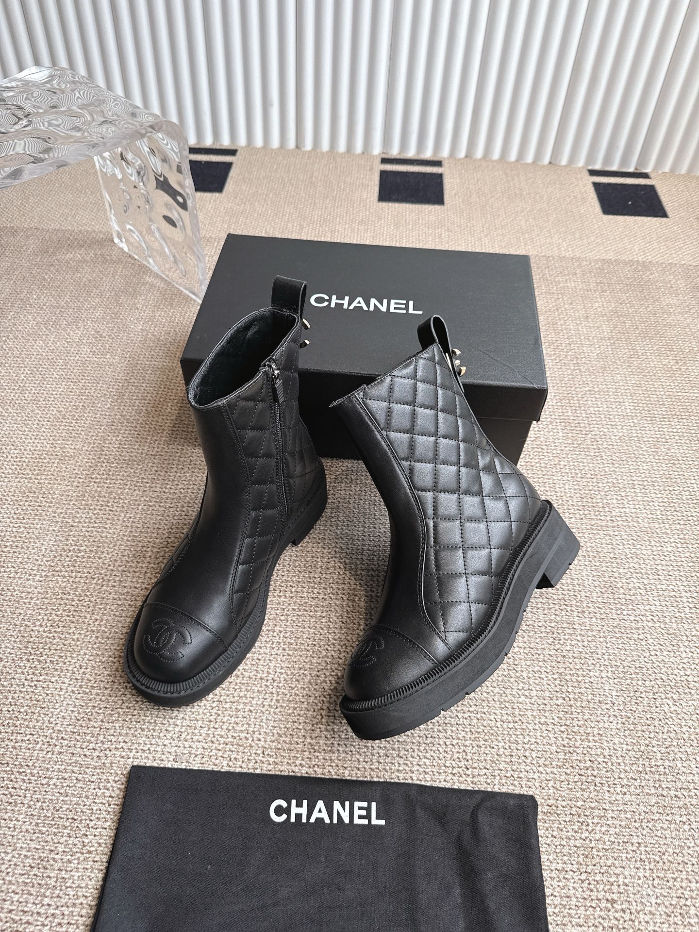 CHANEL ANKLE BOOTS IN BLACK QUILTED CALFSKIN