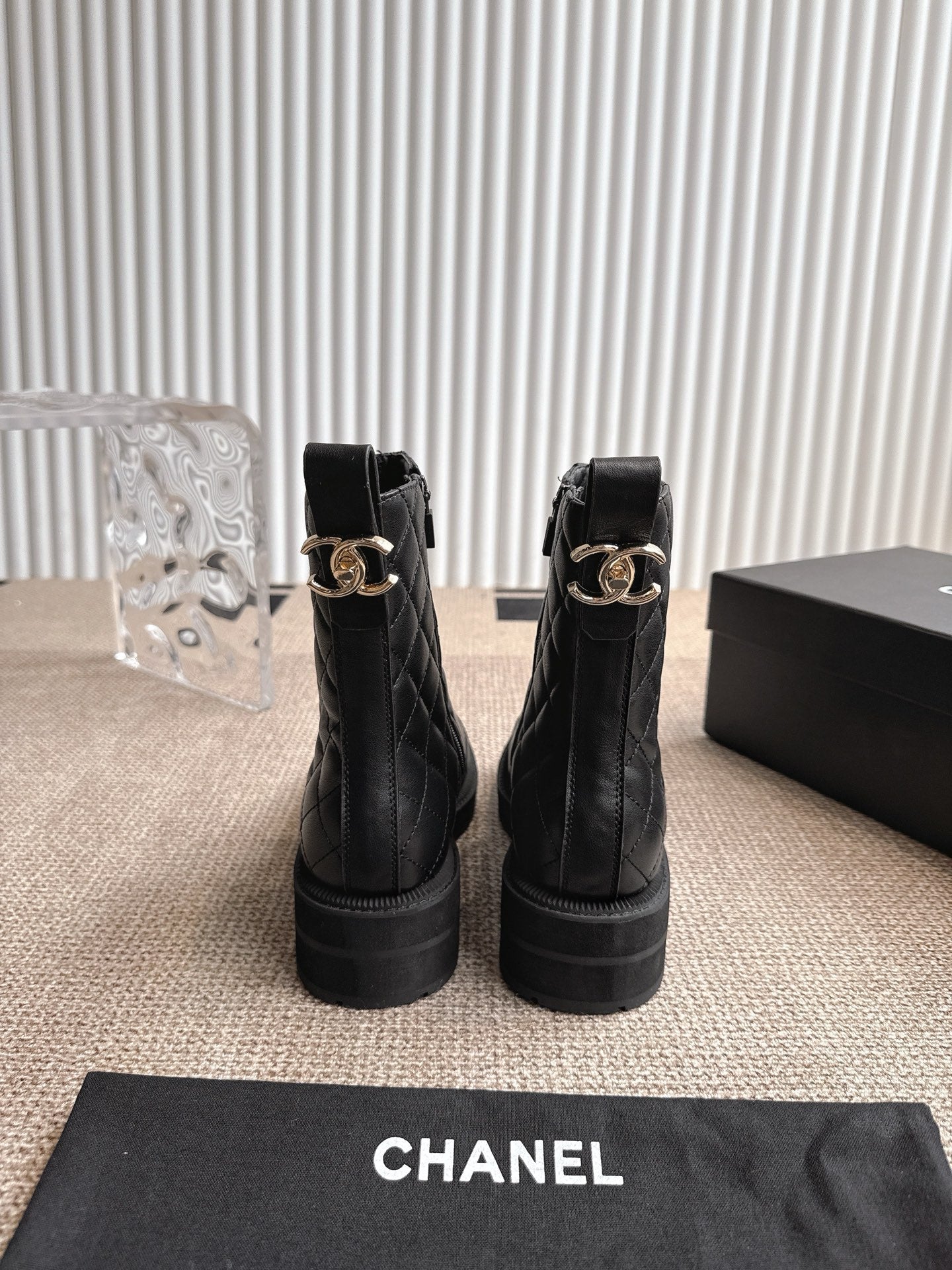 CHANEL ANKLE BOOTS IN BLACK QUILTED CALFSKIN