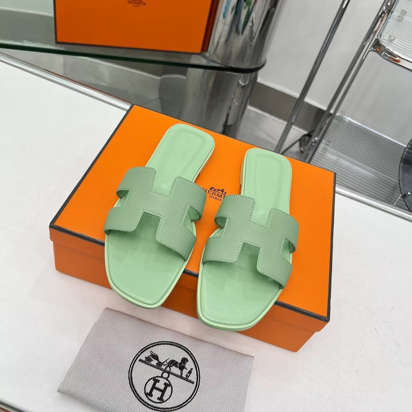 HERMES 0RAN SANDALS IN GREEN PASTEL CALFSKIN