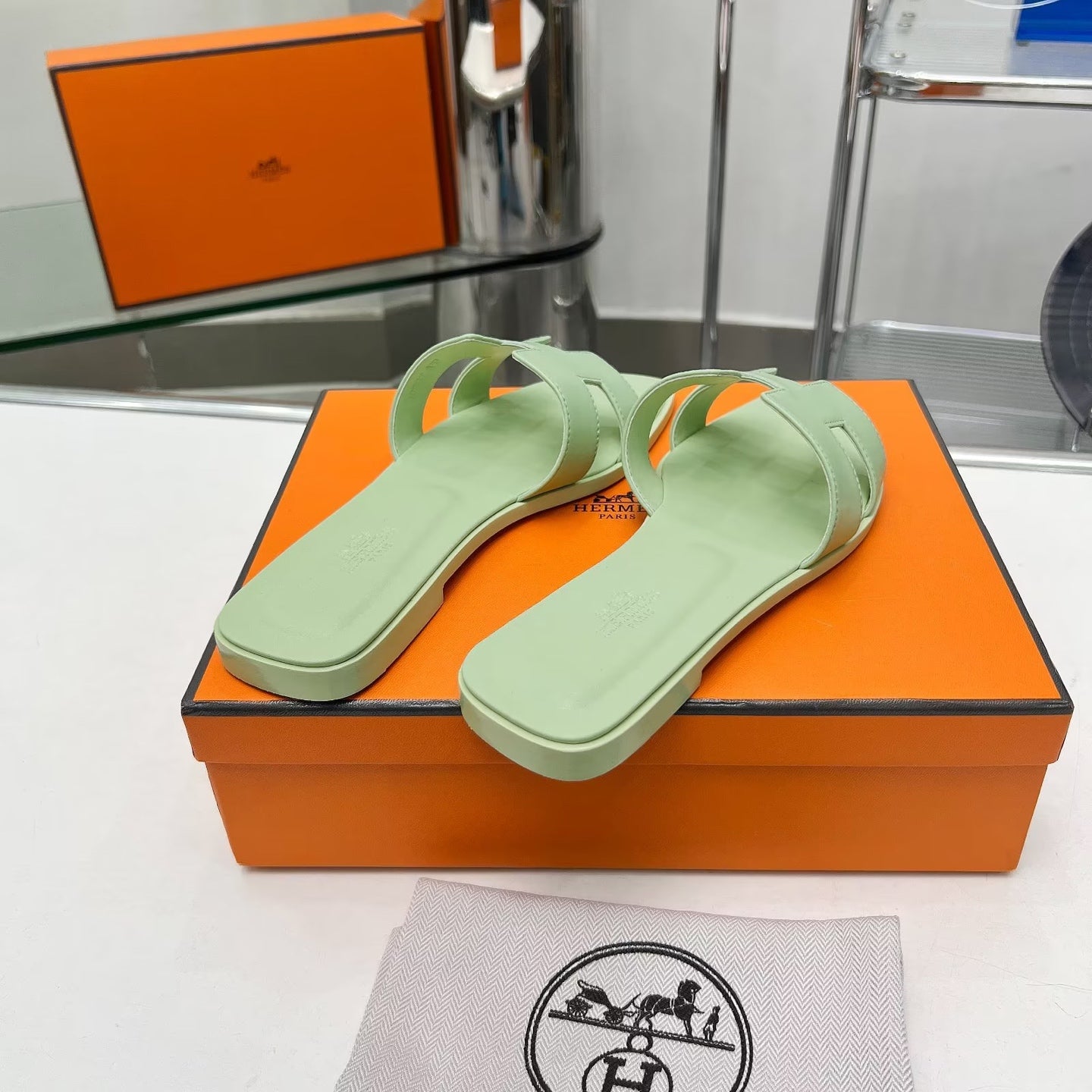 HERMES 0RAN SANDALS IN GREEN PASTEL CALFSKIN