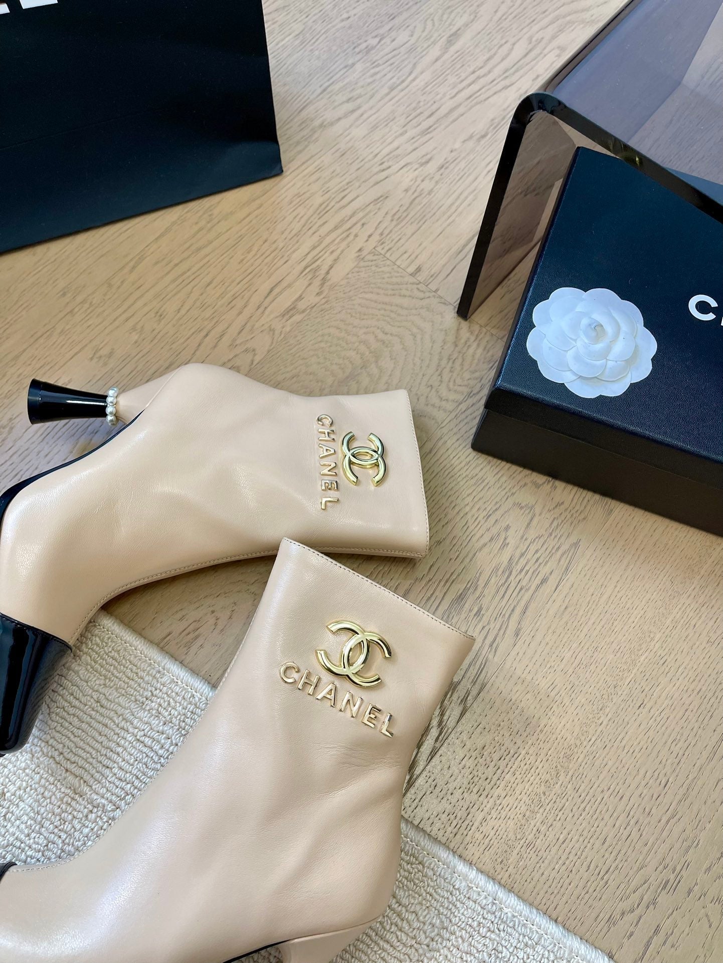CHANEL BONGADE BOOTS IN BEIGE MIX BLACK CALFSKIN