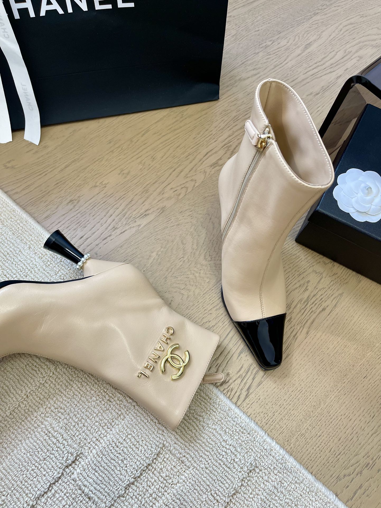 CHANEL BONGADE BOOTS IN BEIGE MIX BLACK CALFSKIN