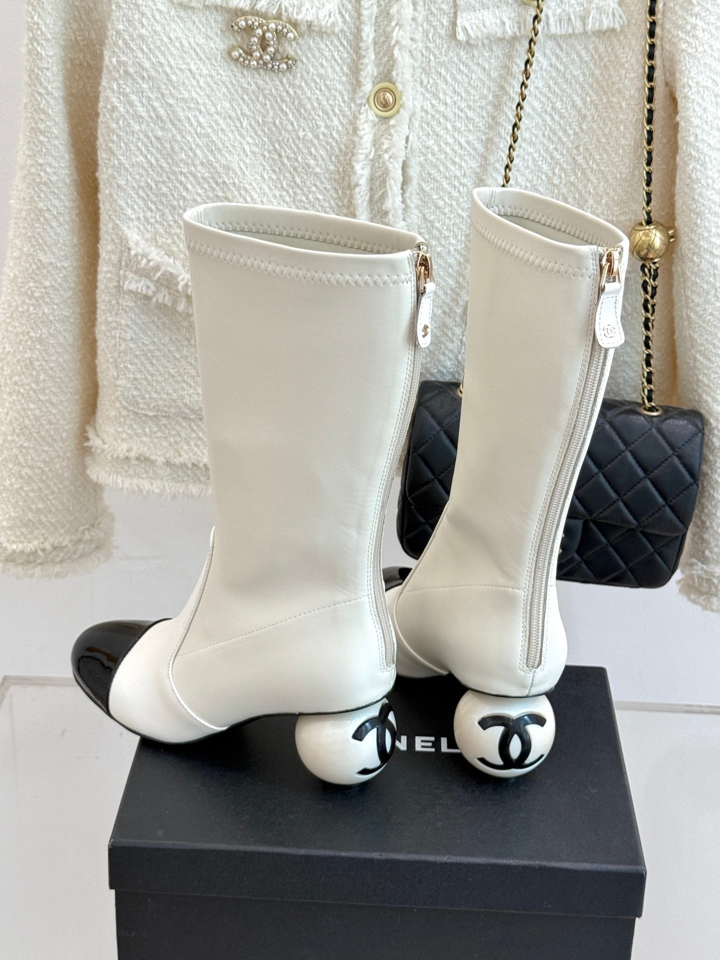 CHANEL PEARL BOOTS IN WHITE CALFSKIN