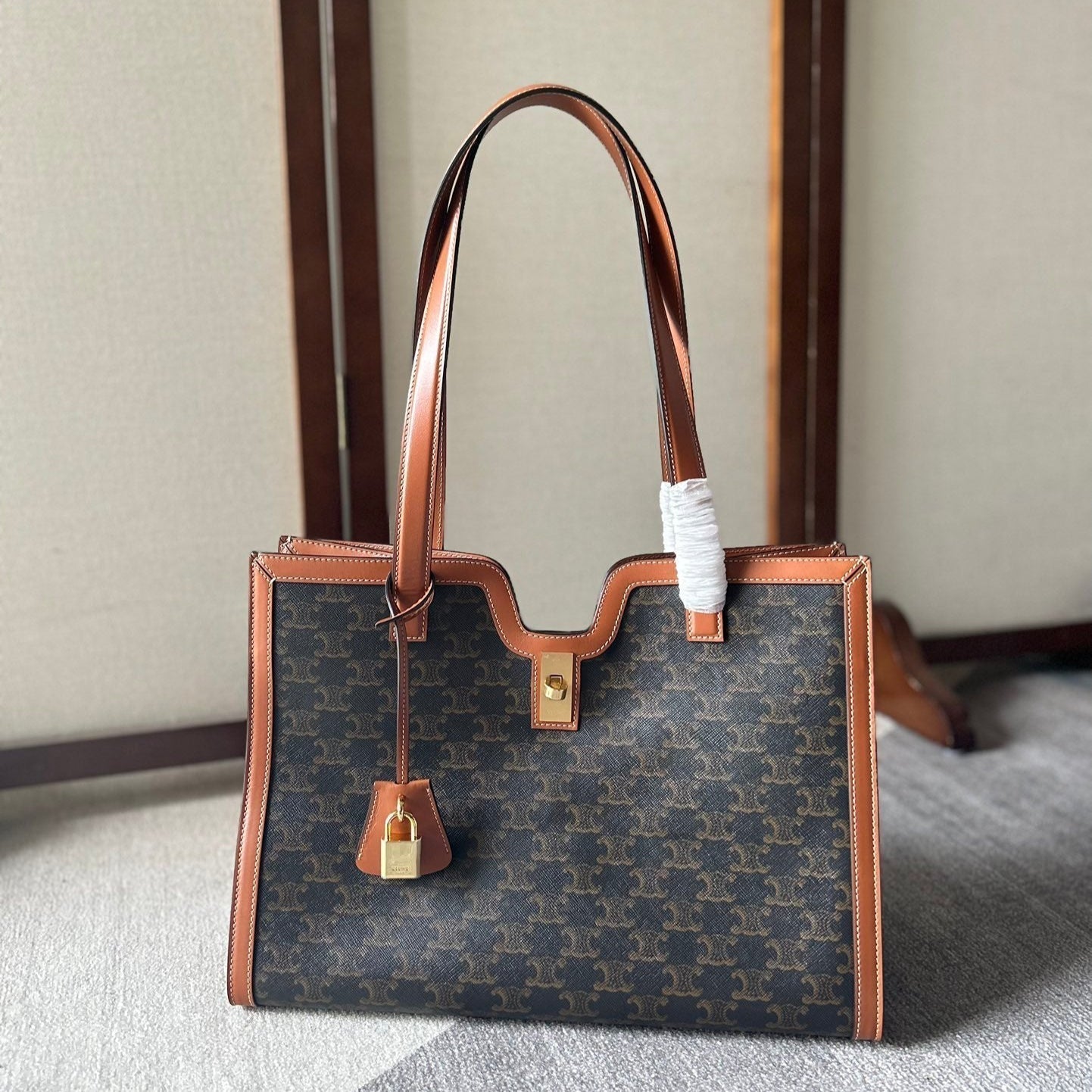CELINE CABAS 37 IN BLACK TRIOMPHE CANVAS AND BRONZE BROWN CALFSKIN TRIM GOLD LOCK