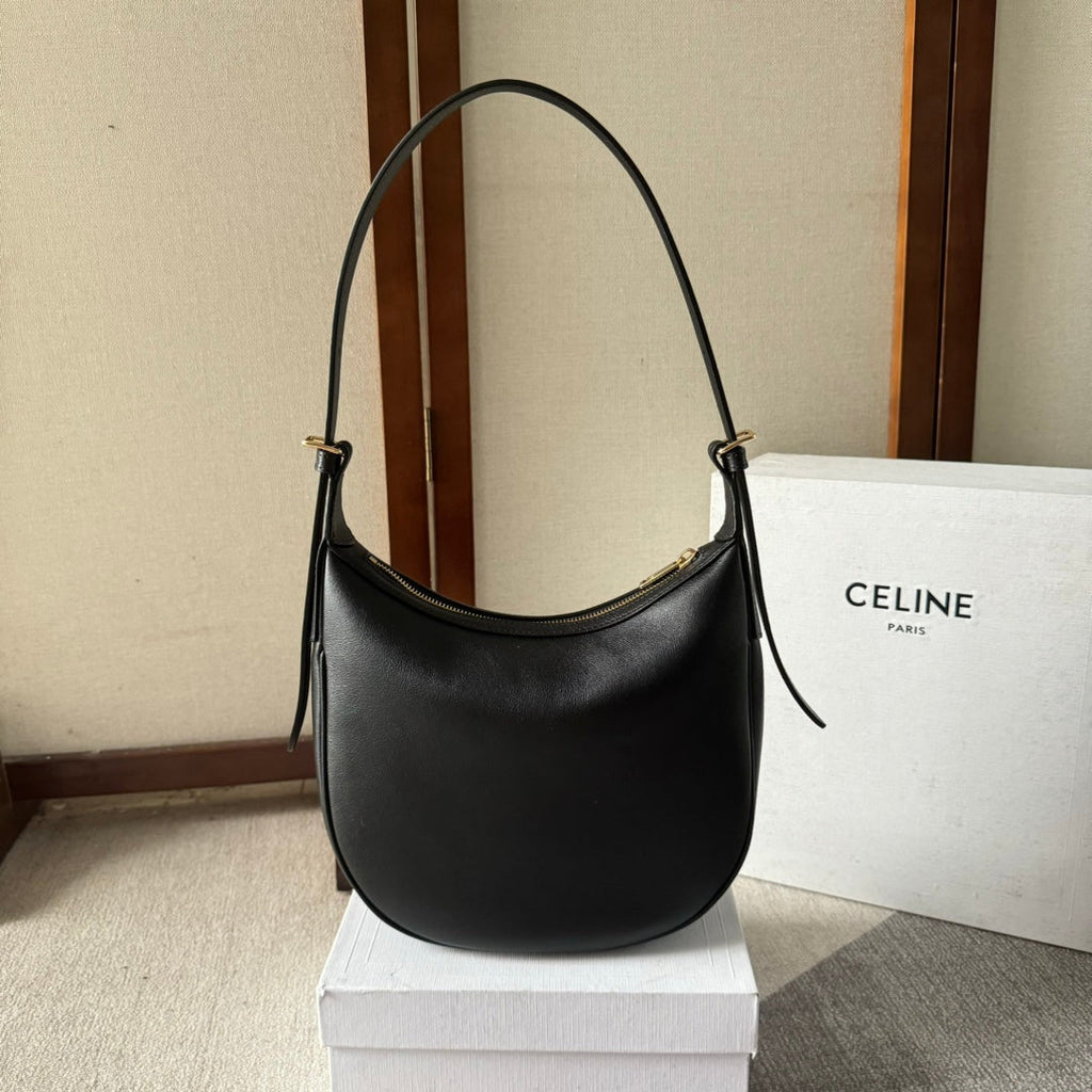 CELINE SMALL HELOÏSE BAG CUIR 22 IN BLACK CALFSKIN EMBOSSED LOGO