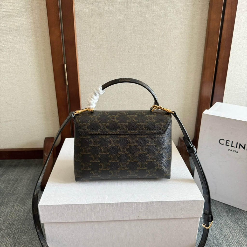CELINE TEEN NINO BAG 20 IN BLACK TRIOMPHE CANVAS GOLD HARDWARE
