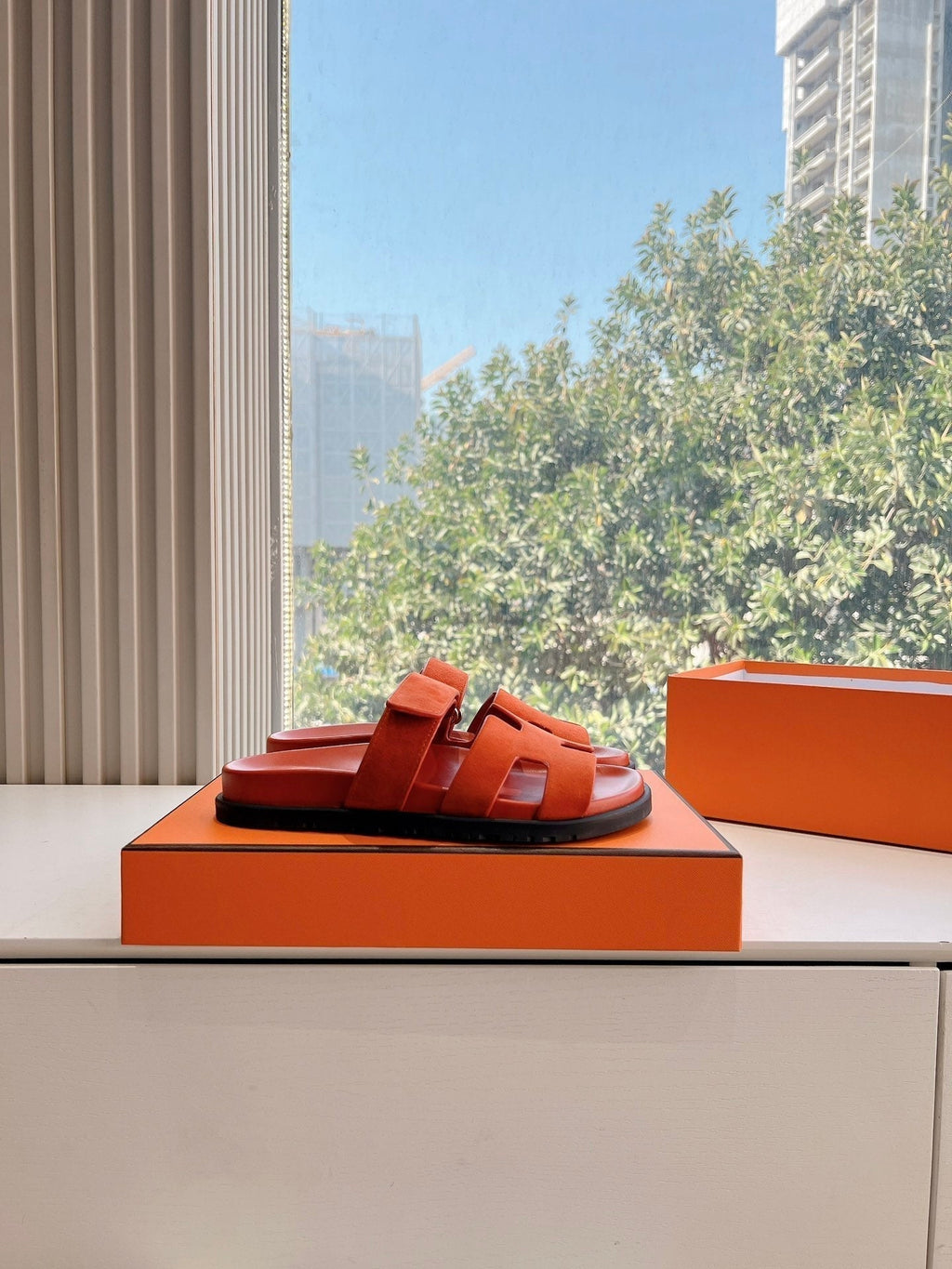 HERMES CHYPRE SANDAL IN FIRE ORANGE SUEDE