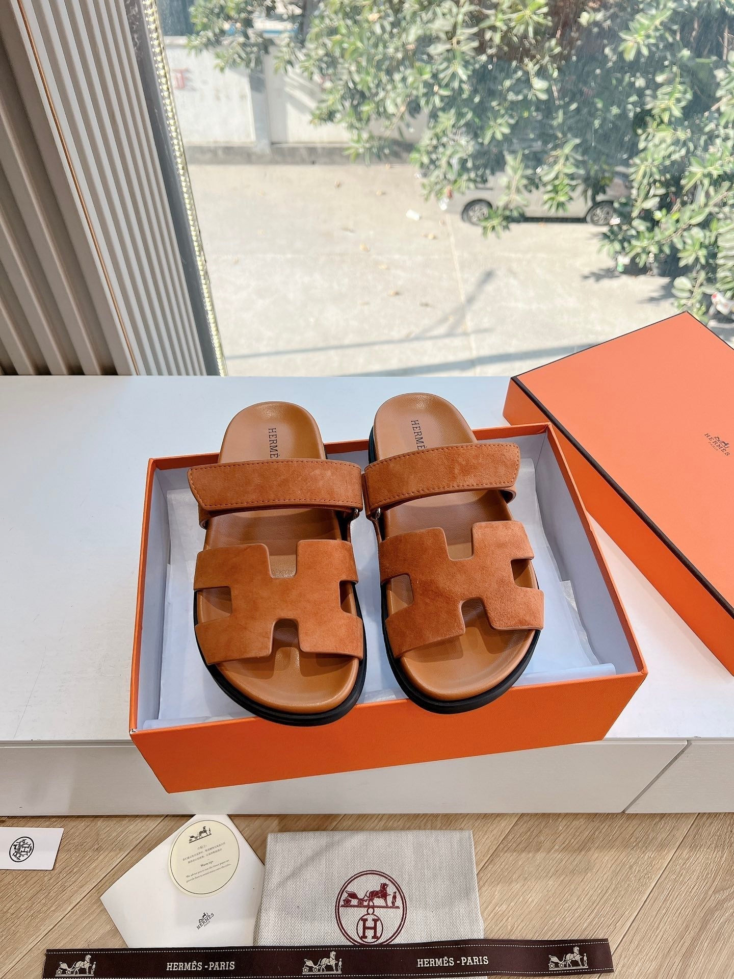 HERMES CHYPRE SANDAL IN VIVID ORANGE SUEDE