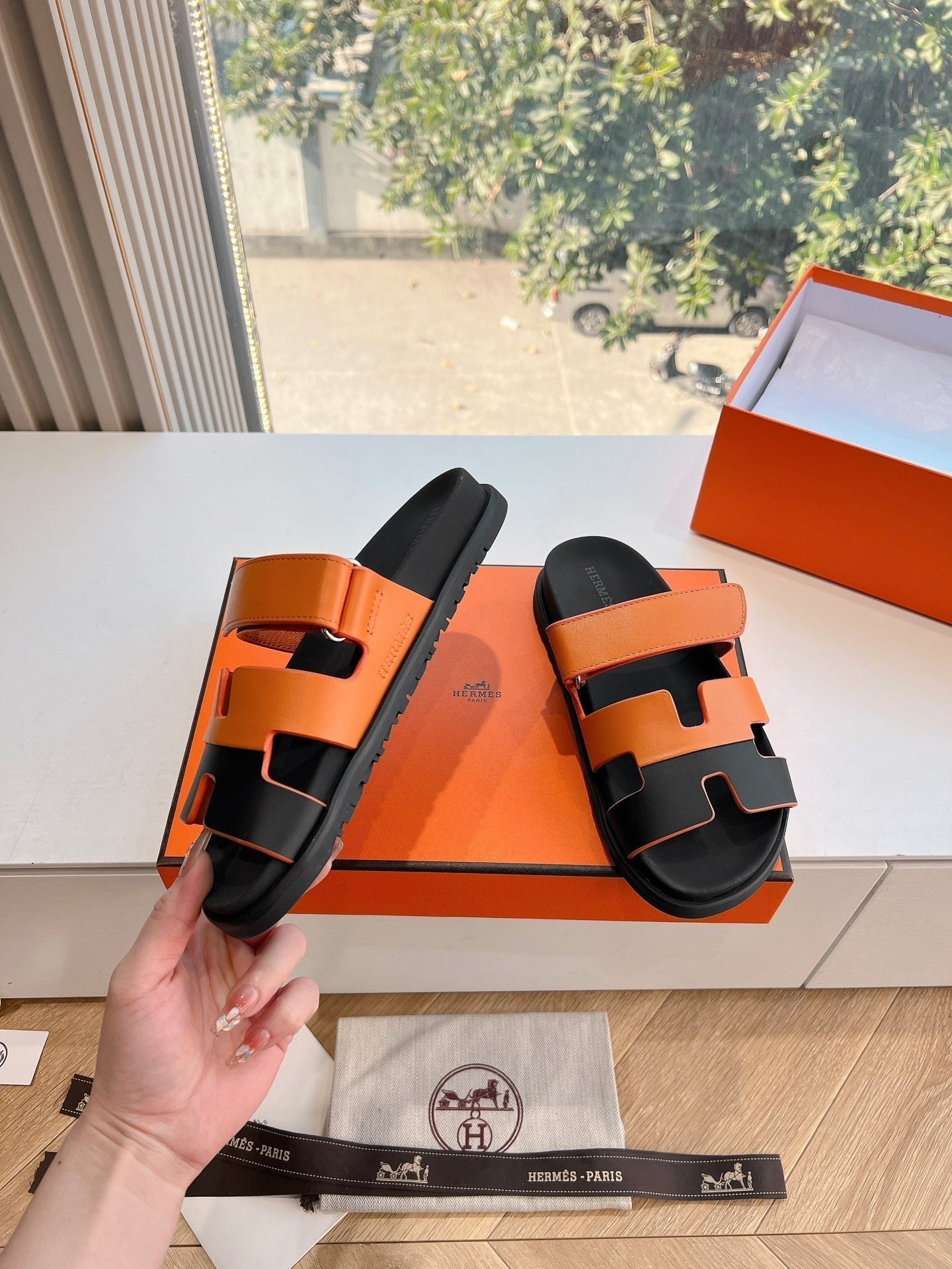 HERMES CHYPRE SANDAL IN VIVID ORANGE MIX BLACK CALFSKIN