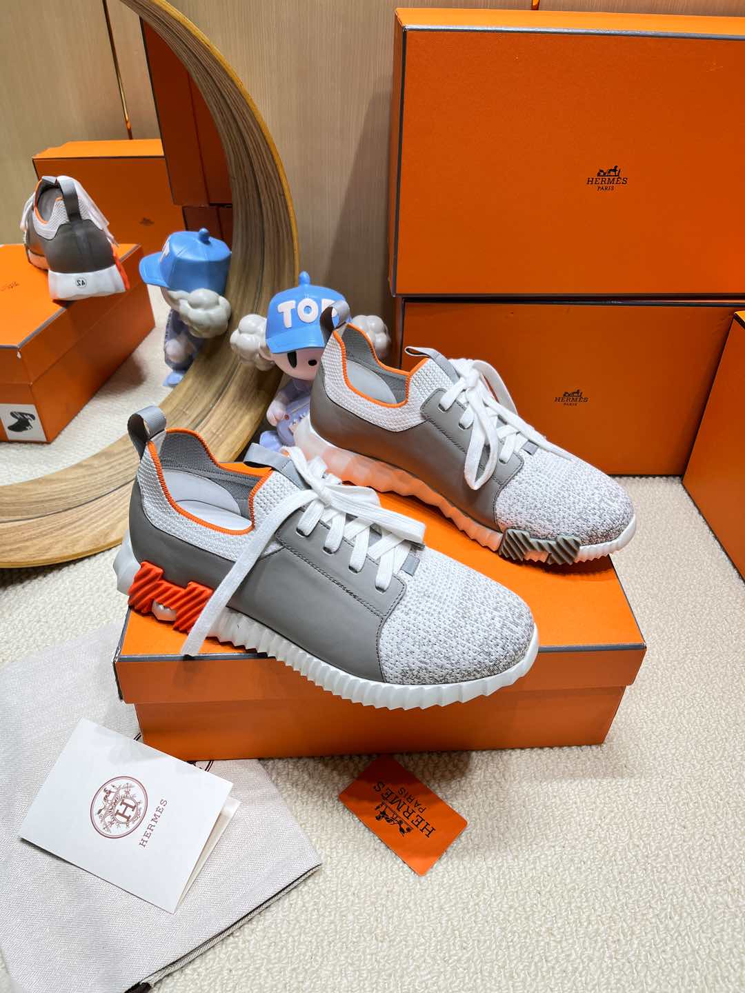 HERMES DEPART SLIP-ON SNEAKER IN WHITE MIX MOUSE GRAY KNIT AND CALFSKIN