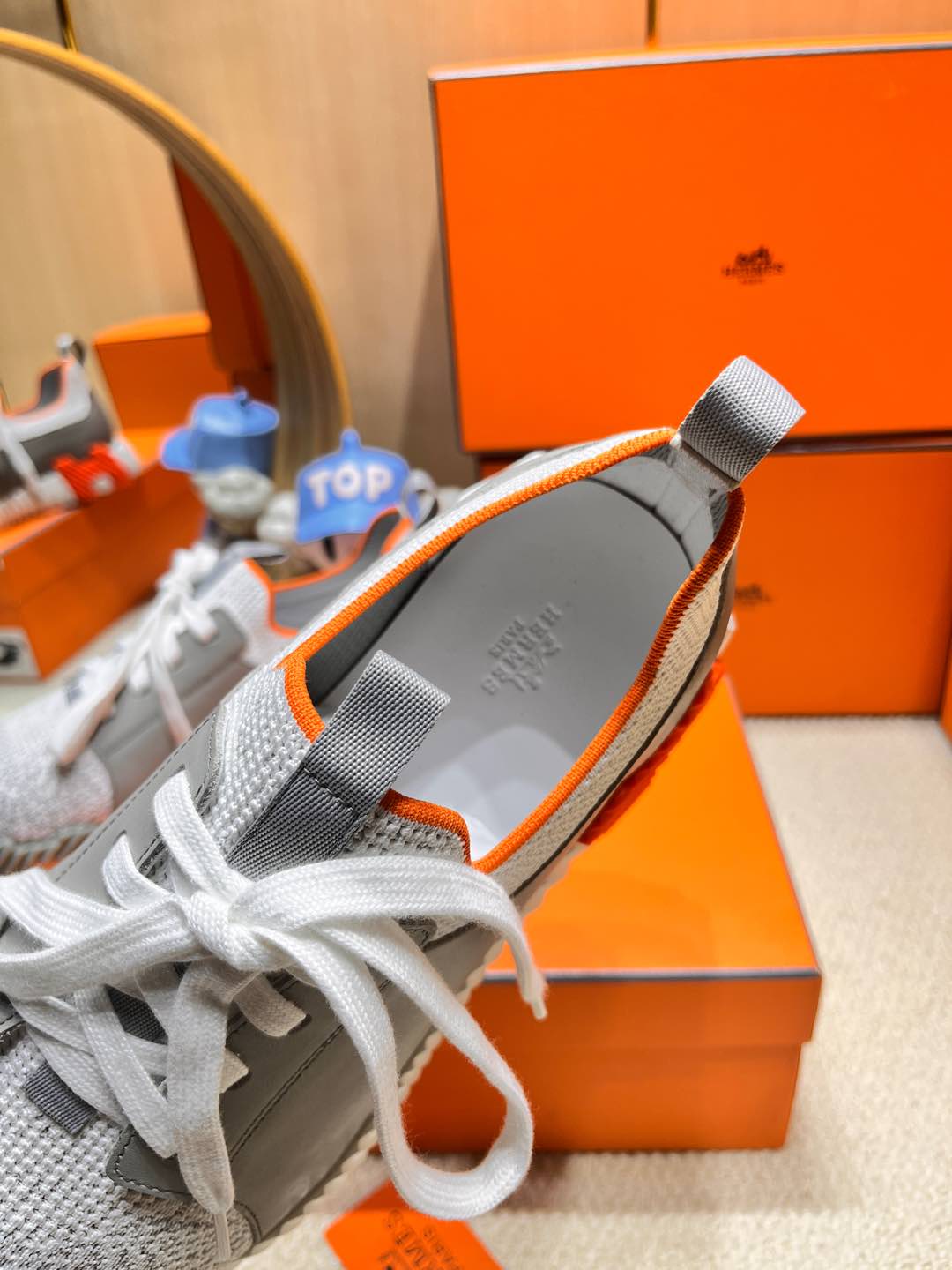 HERMES DEPART SLIP-ON SNEAKER IN WHITE MIX MOUSE GRAY KNIT AND CALFSKIN