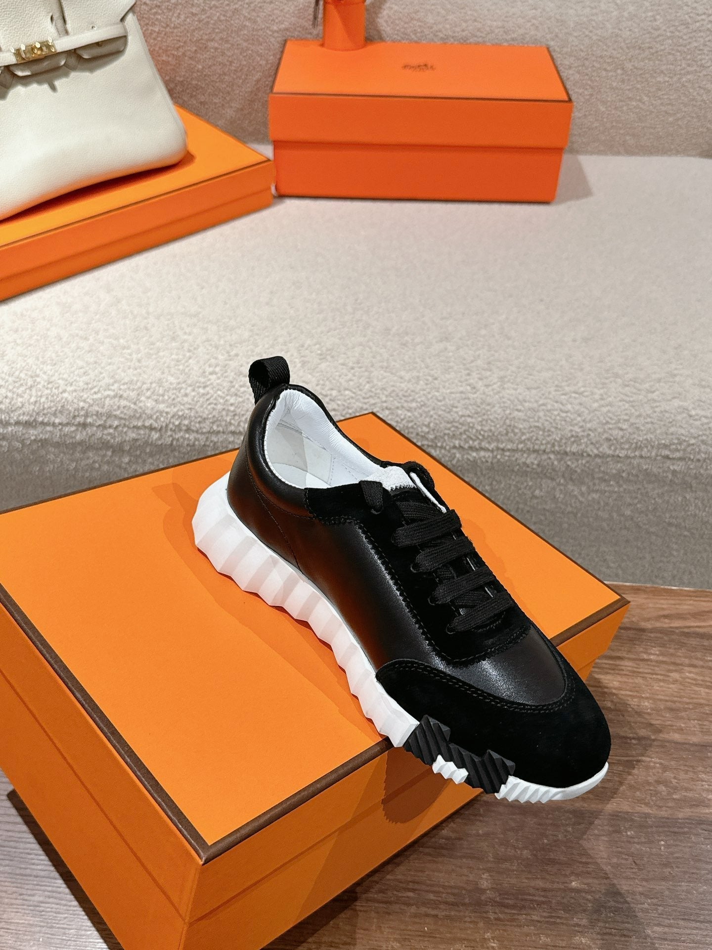 HERMES MAINLAND SNEAKER IN BLACK SUEDE AND CALFSKIN