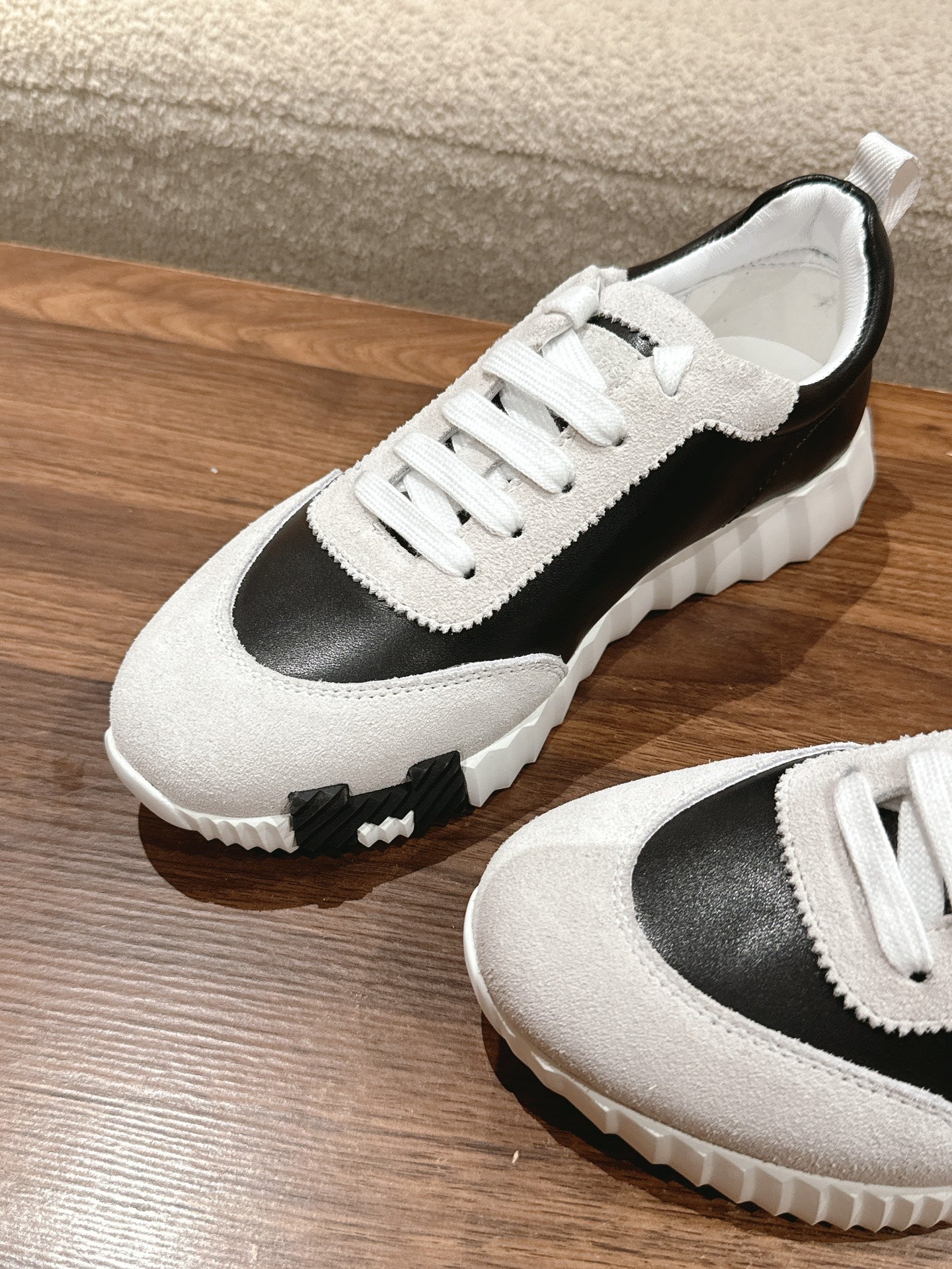 HERMES MAINLAND SNEAKER IN PALE GRAY SUEDE AND BLACK CALFSKIN
