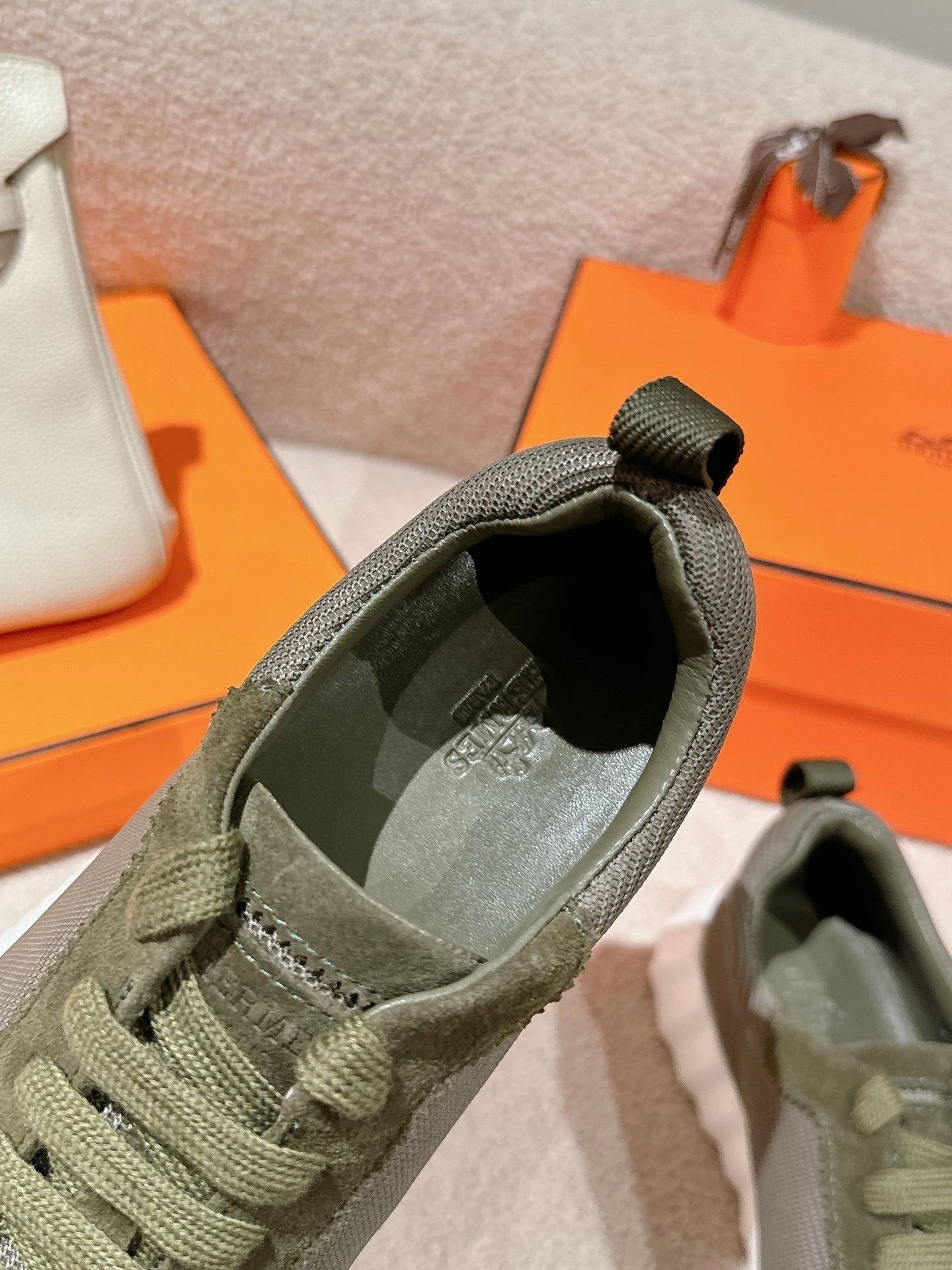 HERMES MAINLAND SNEAKER IN ARMY GREEN SUEDE AND BREATHABLE MESH FABRIC