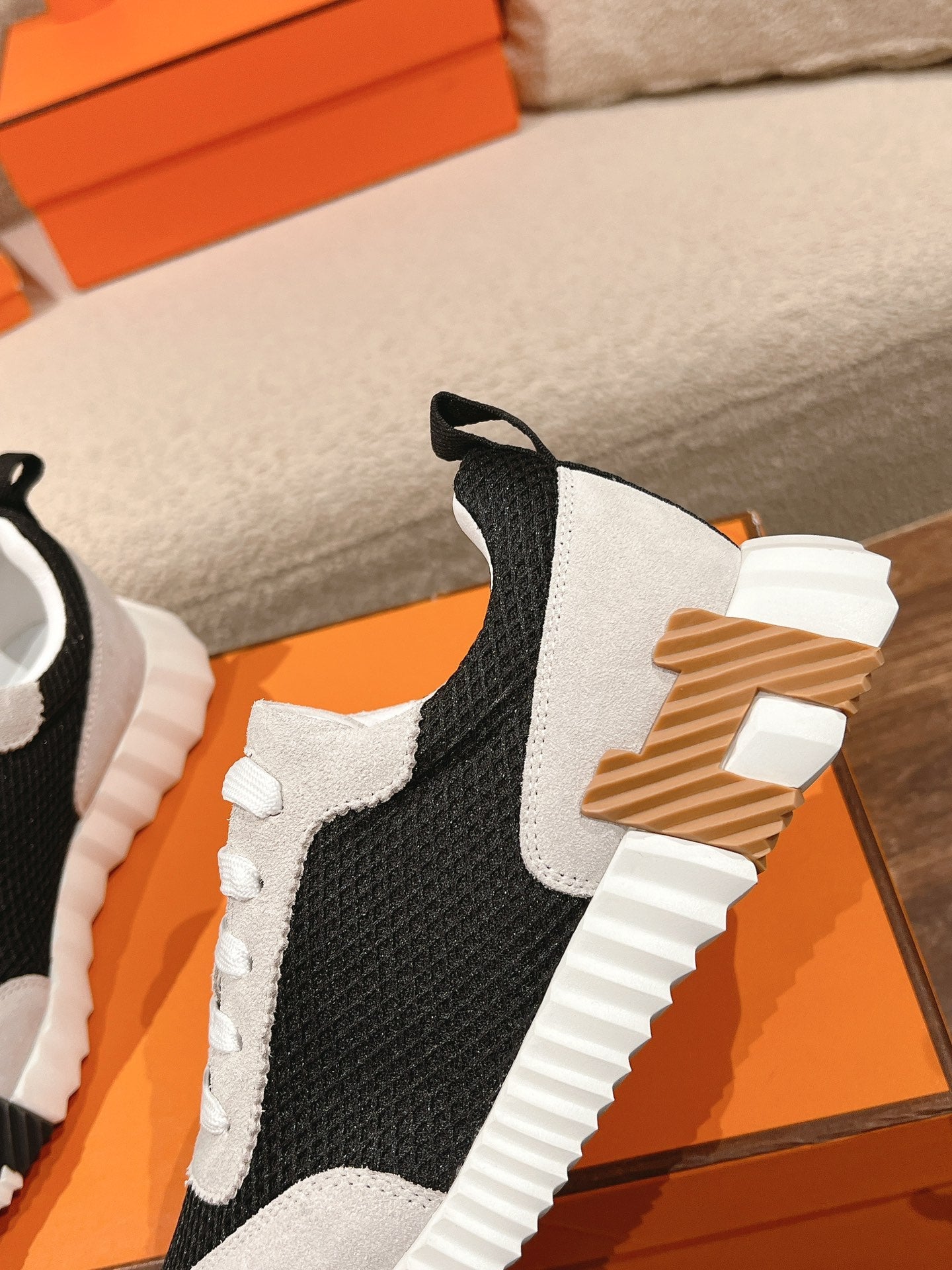 HERMES MAINLAND SNEAKER IN PALE GRAY SUEDE AND BLACK BREATHABLE MESH FABRIC