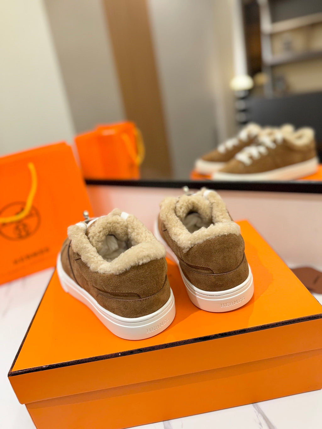 HERMES DAY SNEAKER IN BRONZE BROWN SUEDE AND FLEECE LINING