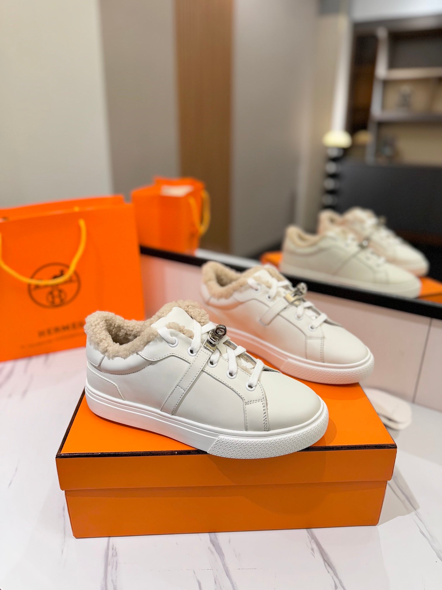 HERMES DAY SNEAKER IN WHITE CALFSKIN AND FLEECE LINING