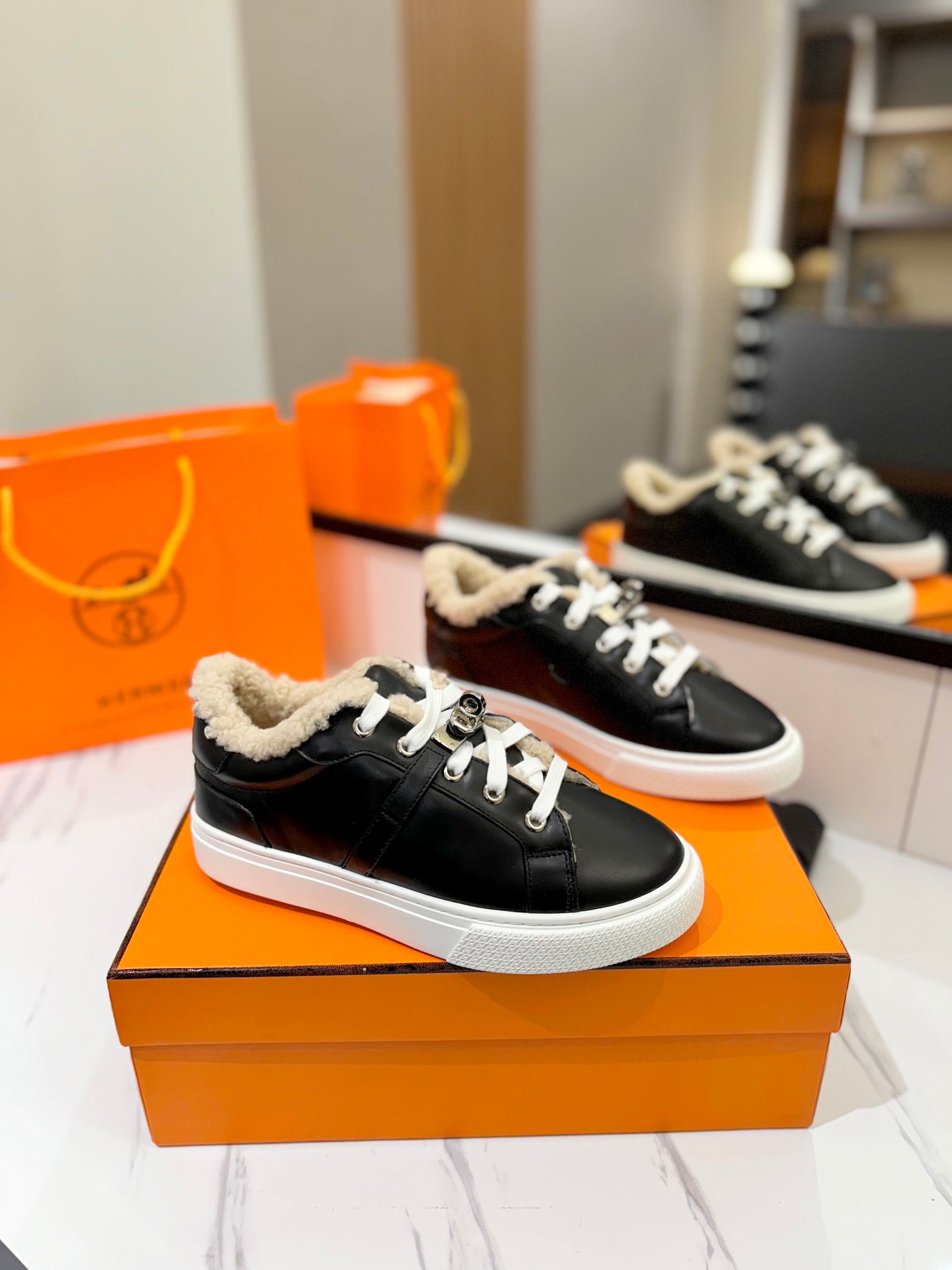HERMES DAY SNEAKER IN BLACK CALFSKIN AND FLEECE LINING